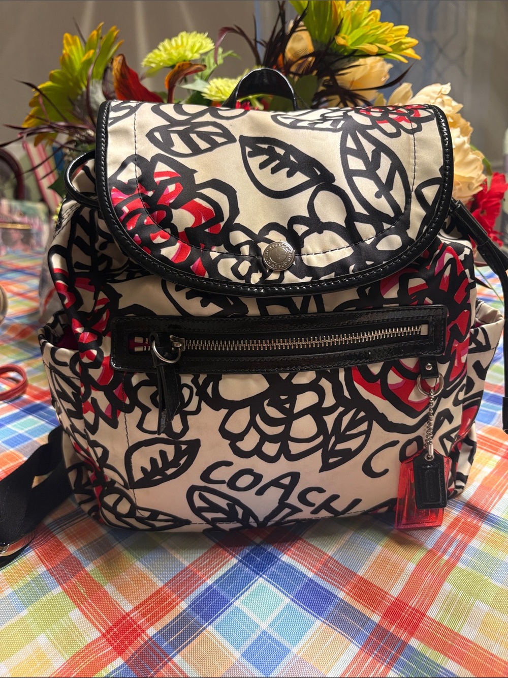 Coach Black & White Floral Backpack with Red Accents
